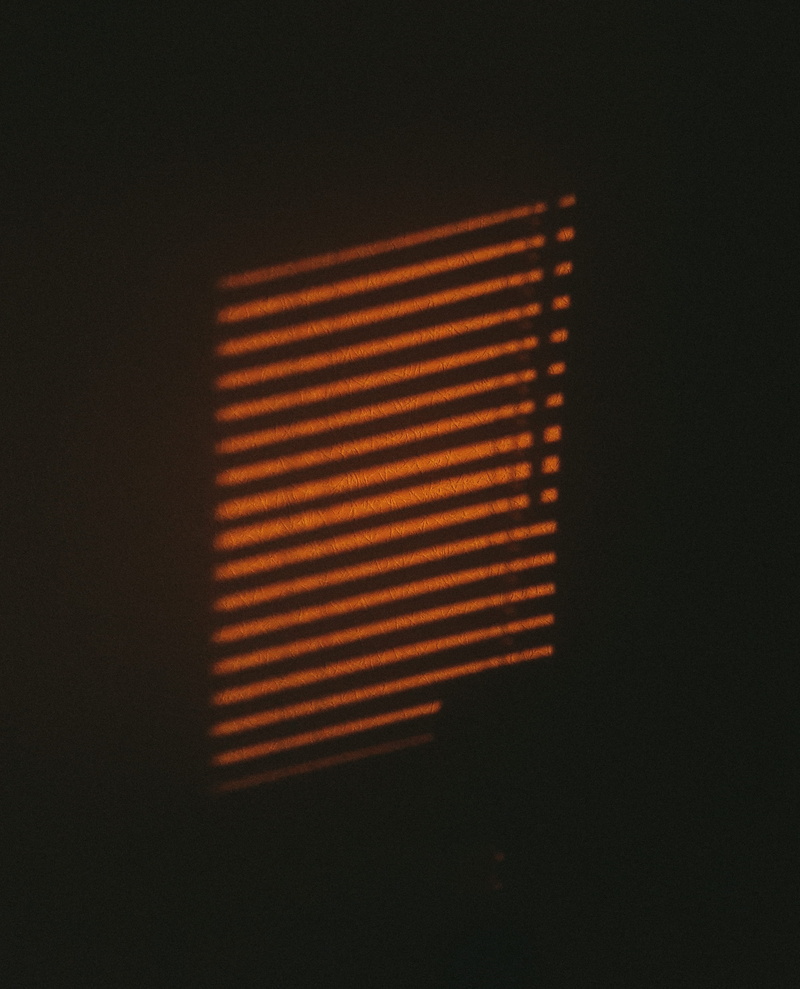 pattern, lamp, dark, star shape, bars, flag, window shade, sunlight, nature, interior design, shadow, orange color, striped, close-up, lights, lamp post