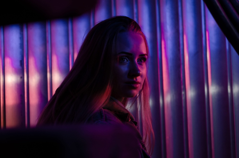 human, beautiful woman, window shade, stage, portrait, one person, mouth, finger, indoors, adult, human face, purple, nightlife, shutter, dark, window