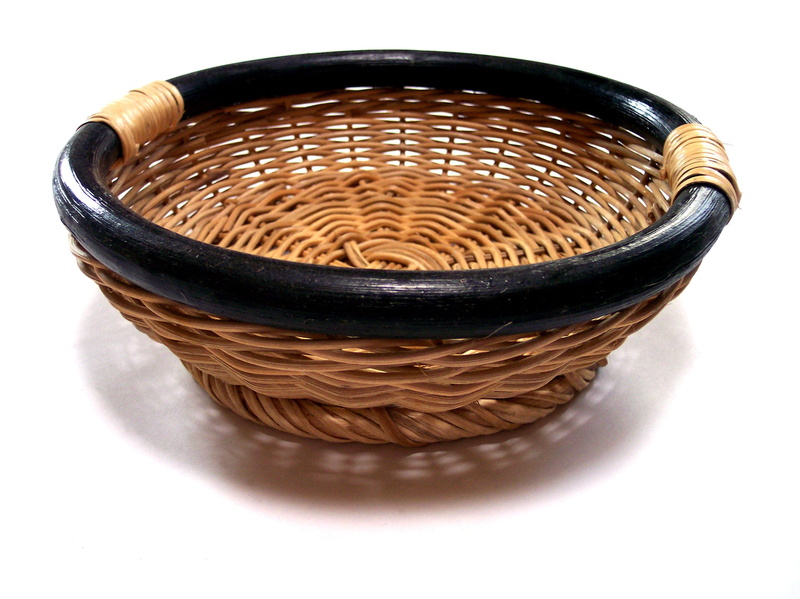 no People, handle, wood - Material, brown, backgrounds, studio shot, close-up, indoors, food and drink, black, baked, round, wicker, craft, braided, snack