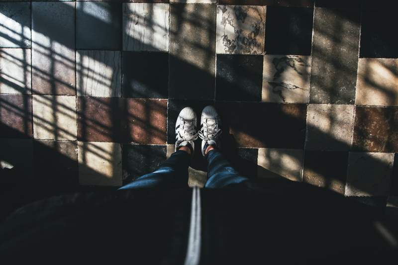 nature, high, shadow, white, angle, room, flooring, floor, stone, unrecognizable person, low section, jeans, leg, blue, human body part, personal perspective