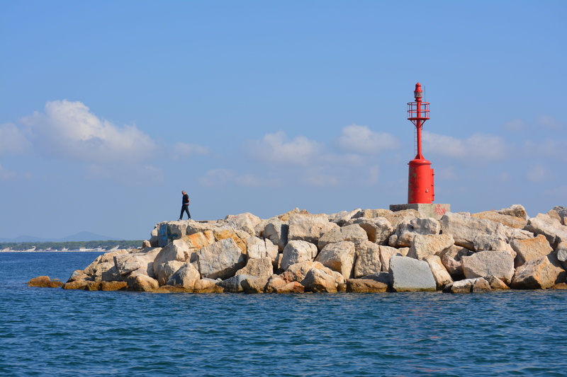 direction, building exterior, lighthouse, security, italy, architecture, sea, water, groyne, solid, rock - object, guidance, building, rock, mediterranean