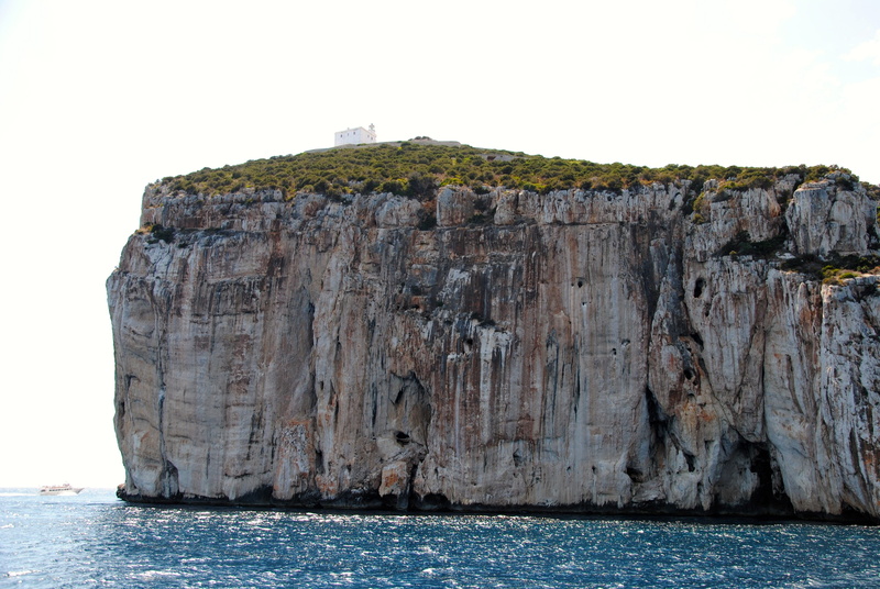waterfront, summer, land, water, outdoors, nature, scenics - nature, cliffs, rock - object, mountain, cliff, day, no people, eroded, non-urban scene, tranquility