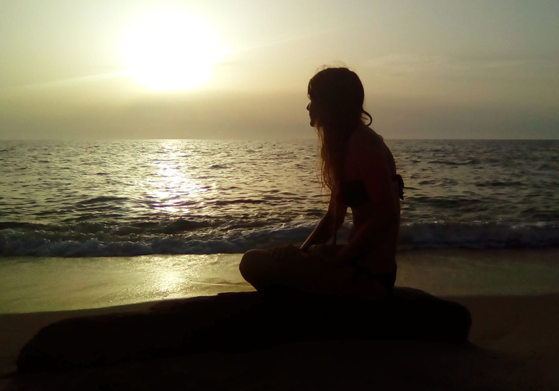 outdoors, one person, sitting, sunlight, horizon, sardegna, sky, island, nature, ocean, scenics - nature, energy, water, body of water, light, solar energy