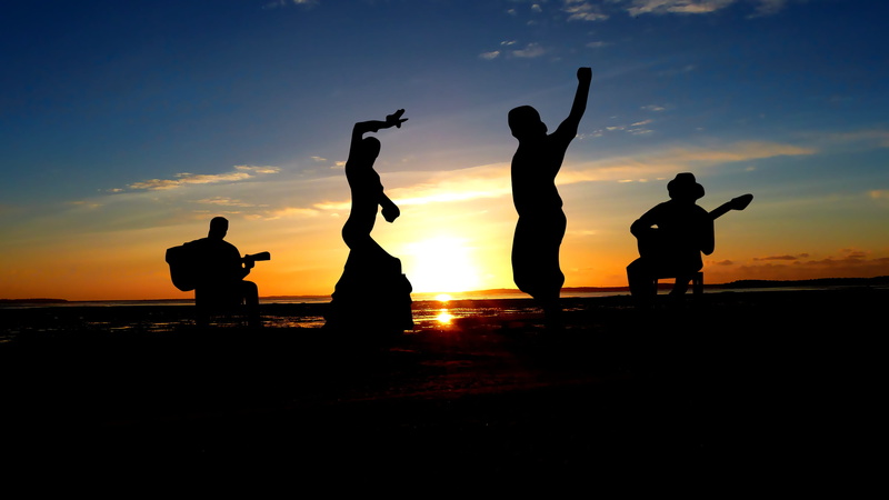 friendship, music, real people, group of people, men, beauty in nature, sunlight, instrument, 4K, concert, land, silhouette, adult, togetherness, orange color