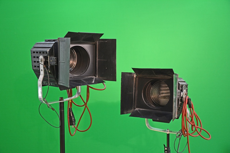 arts culture and entertainment, spot, camera - Photographic Equipment, spotlight, home video camera, green background, stage lighting, communication, theaterspot