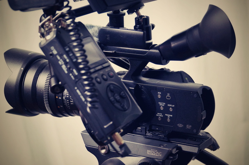 photography themes, photo camera, film, retro look, audio, digital, focus on foreground, black color, tascam, studio shot, machine part, still life, machinery