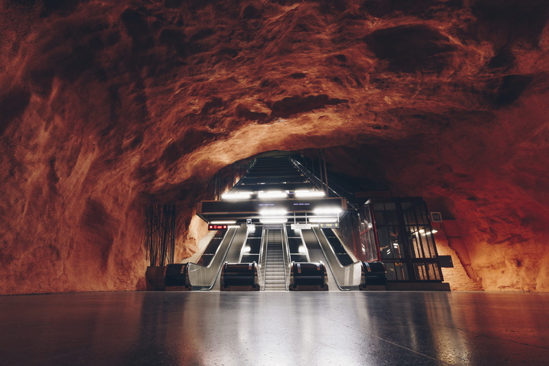 corridor, vehicle, direction, lighting, fashion, low angle view, no people, robe, flooring, transportation, illuminated, built structure, tunnel, escalator