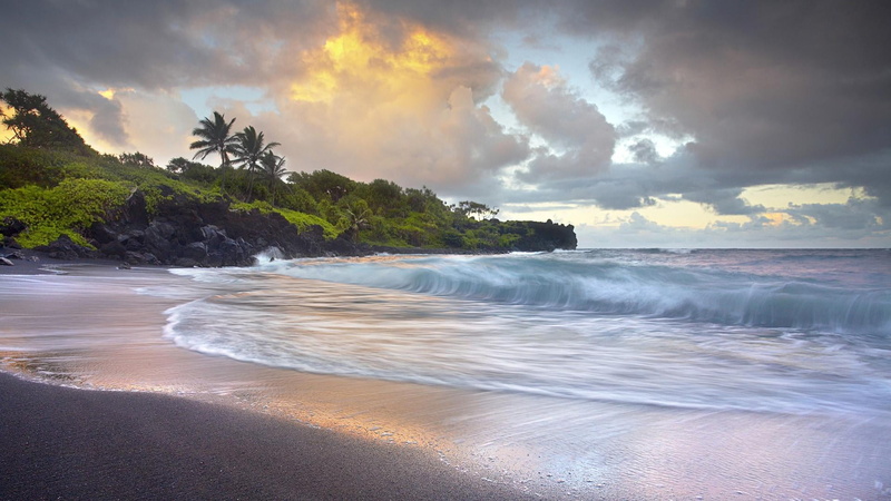 no people, wind, water, aquatic sport, nature, coast, hawaii, power in nature, sky, wind wave, wave, sea, shore, palm tree, tropical climate, cloud, black sand beach
