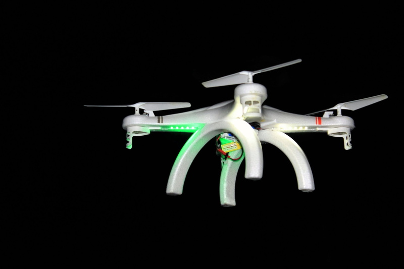 toy, no people, machine part, air vehicle, technology, background image, weapon, transportation, robot, Drone, human representation, night, security, military