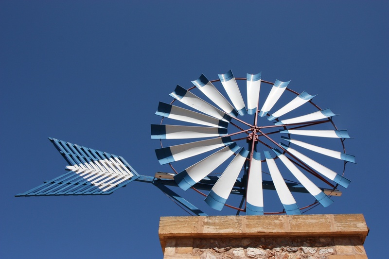 wind turbine, alternative energy, directly below, low angle view, no people, technology, traditional windmill, nature, sky, building exterior, pinwheel