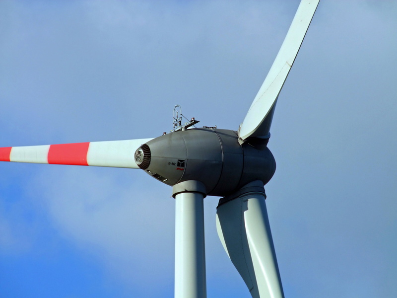 electricity production, environmental technology, low angle view, renewable energy, architecture, environment, clear sky, wind energy, environmental conservation