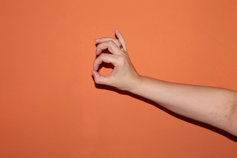 human arm, limb, women, one person, indoors, close-up, Ok, human body part, Hands, adult, touching, orange color, Finger, human hand, nail, body part, orange background