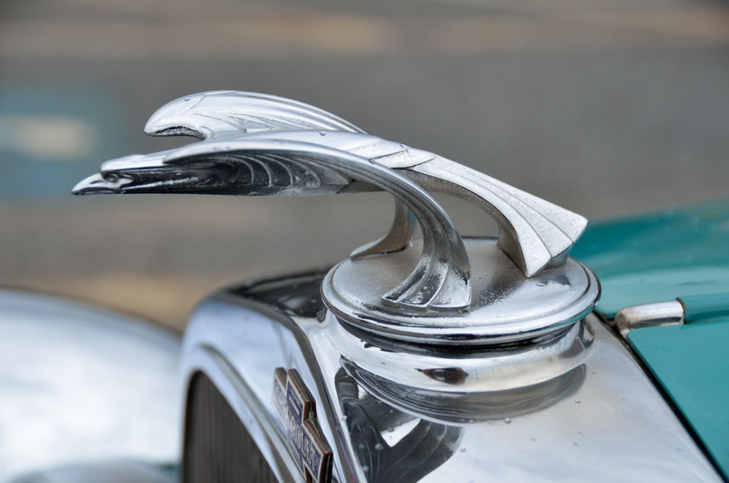 car show, day, show, front, old-fashioned, vehicle, 4K, stainless steel, focus on foreground, land vehicle, transportation, design, hood ornament, car