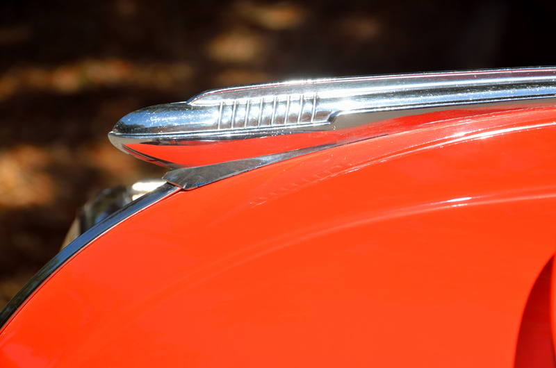 icon, text, day, automobile, sports car, metal, luxury, red, land vehicle, shiny, style, nature, motor vehicle, vintage, transportation, close-up, classic