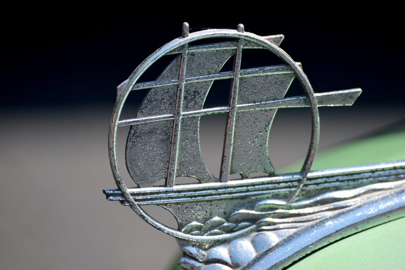 retro, close-up, colored background, chrome, security, still life, net - sports equipment, metal, automobile, vintage, ball, 5K, studio shot, 1934 plymouth car