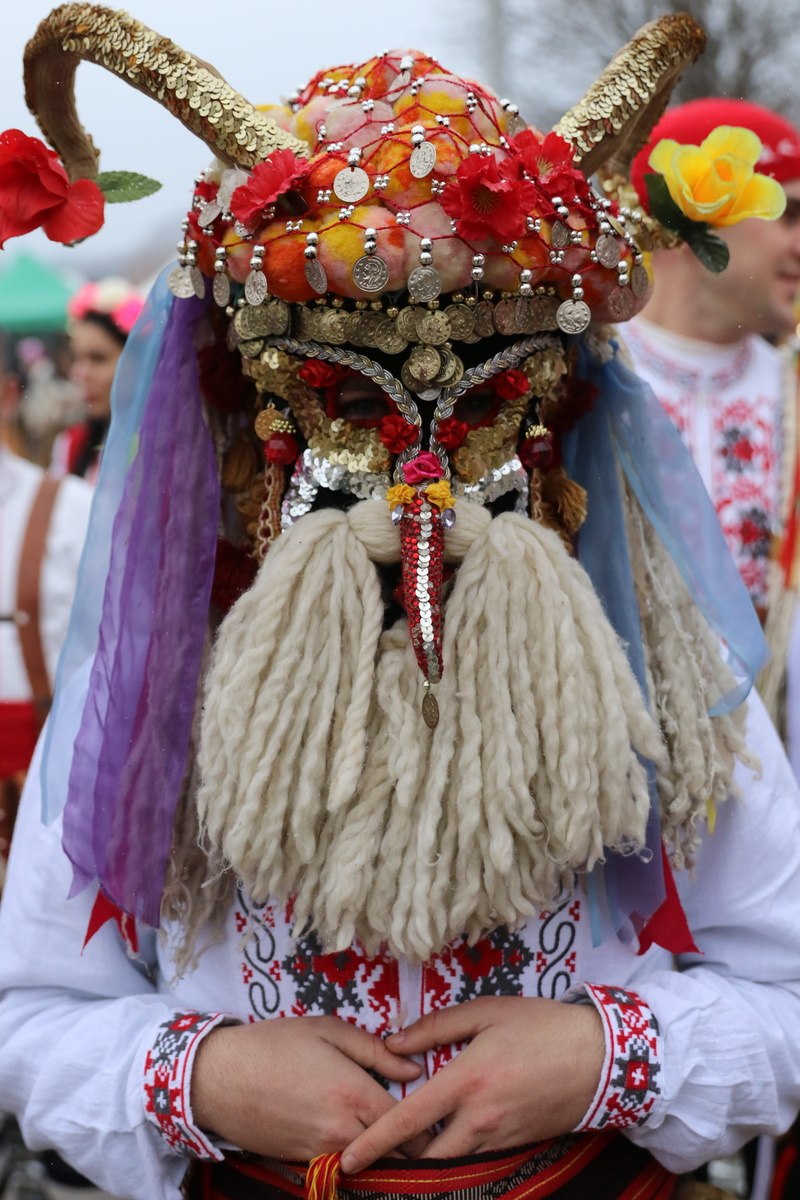 close-up, event, focus on foreground, festival, real people, uncircumcised, headdress, incidental people, adult, 5K, costume, ritual games, obscured face
