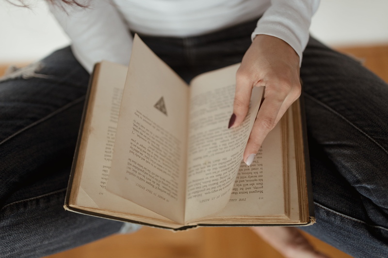 midsection, activity, studying, female, caucasian, holding, reading, indoors, girl, paper, men, beautiful, jeans, high angle view, communication, human hand