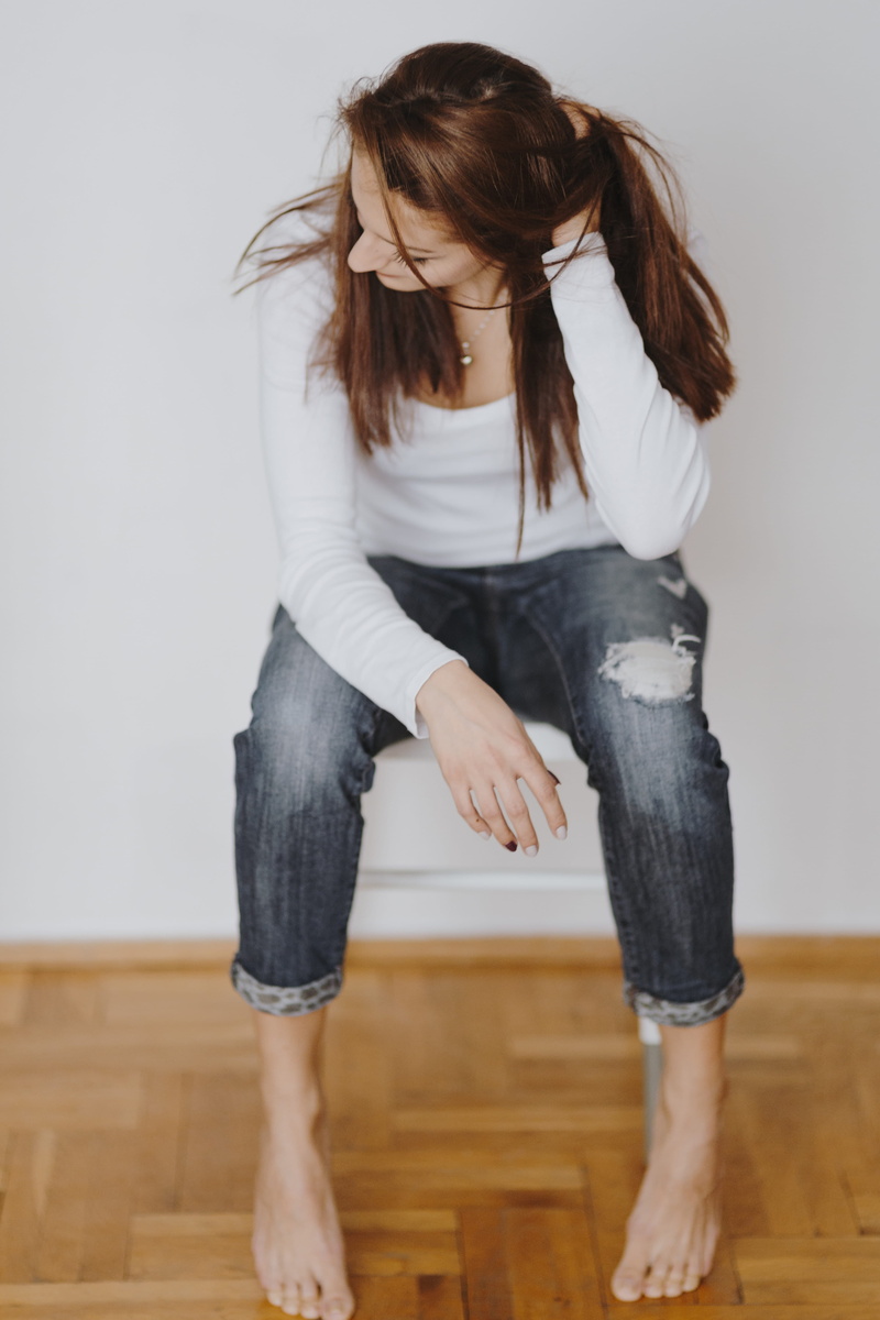 book, long hair, women, casual clothing, caucasian, real people, young, student, lifestyles, indoors, woman, young women, hair, wood, reading, hairstyle