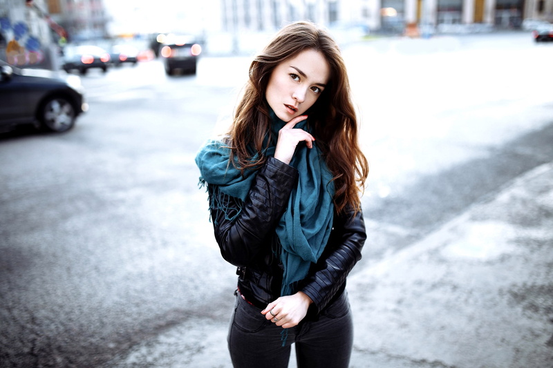 front view, outdoors, young adult, warm clothing, real people, leather jackets, hairstyle, women, street, day, standing, hair, beauty, three quarter length