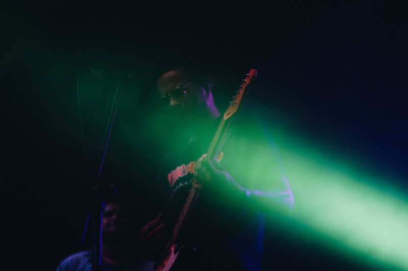 indoors, one person, thrasher, string instrument, musician, playing, performing arts event, nightlife, arts culture and entertainment, rock music, performance