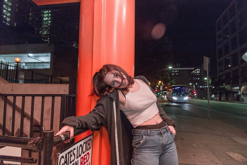 woman, art, leisure activity, girl, night, wear, built structure, orange, architecture, real people, three quarter length, young adult, outdoors, front view