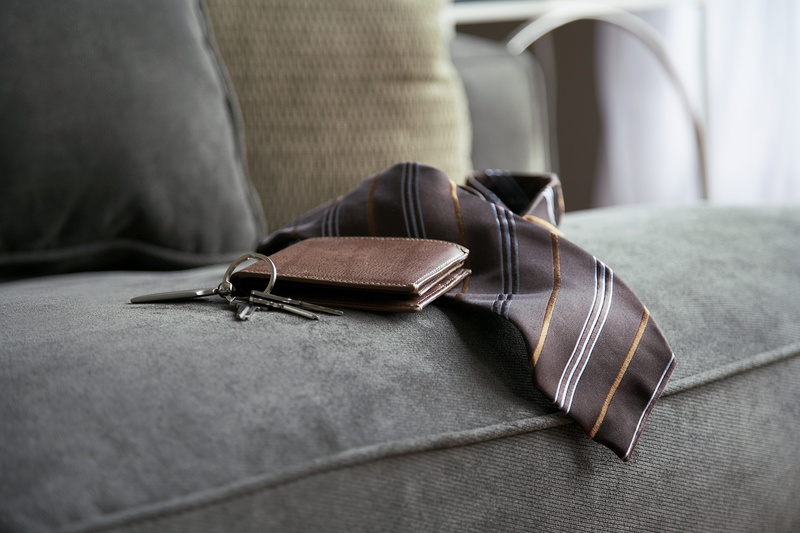 absence, formalwear, brown, luxury, indoors, clothing, textile, occupation, sofa, black color, no people, adult, businessman, tie, bag, elegance, modern