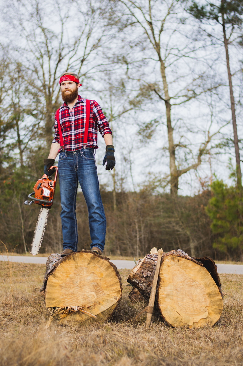 nature, pants, firewood, portrait, full length, standing, footwear, day, holding, shoe, flannel, hair, denim, tree, person, farmer, wood, young adult, casual clothing