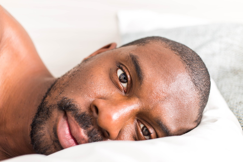 body part, look, black man, pose, relaxation, lying down, bedroom, 5K, model, one person, position, lying, lifestyles, rest, resting, headshot, lay, beautiful woman