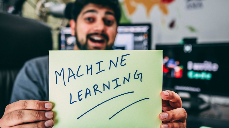paper, 2K, hand, machine learning, text, technology, human body part, sign, males, focus on foreground, people, indoors, contemplation, latest tech, emotion