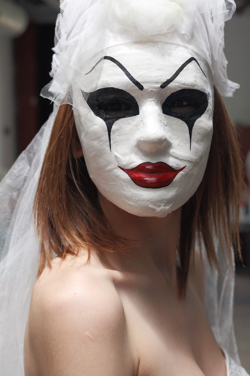 hairstyle, indoors, spooky, color, human, front view, costume, taking, beautiful, mask, lips, paint, art, woman, selfie, obscured face, talent, style, mask - disguise