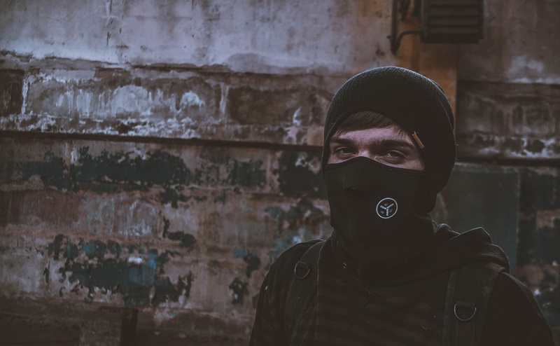 one person, mask, clothing, architecture, leisure activity, 2K, standing, cap, lifestyles, portrait, obscured face, young men, real people, built structure