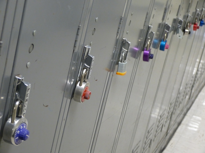 room, box, store, padlocks, low angle view, hall, corridor, number, row, education, built structure, red, belongings, hanging, student, security, wall - building feature