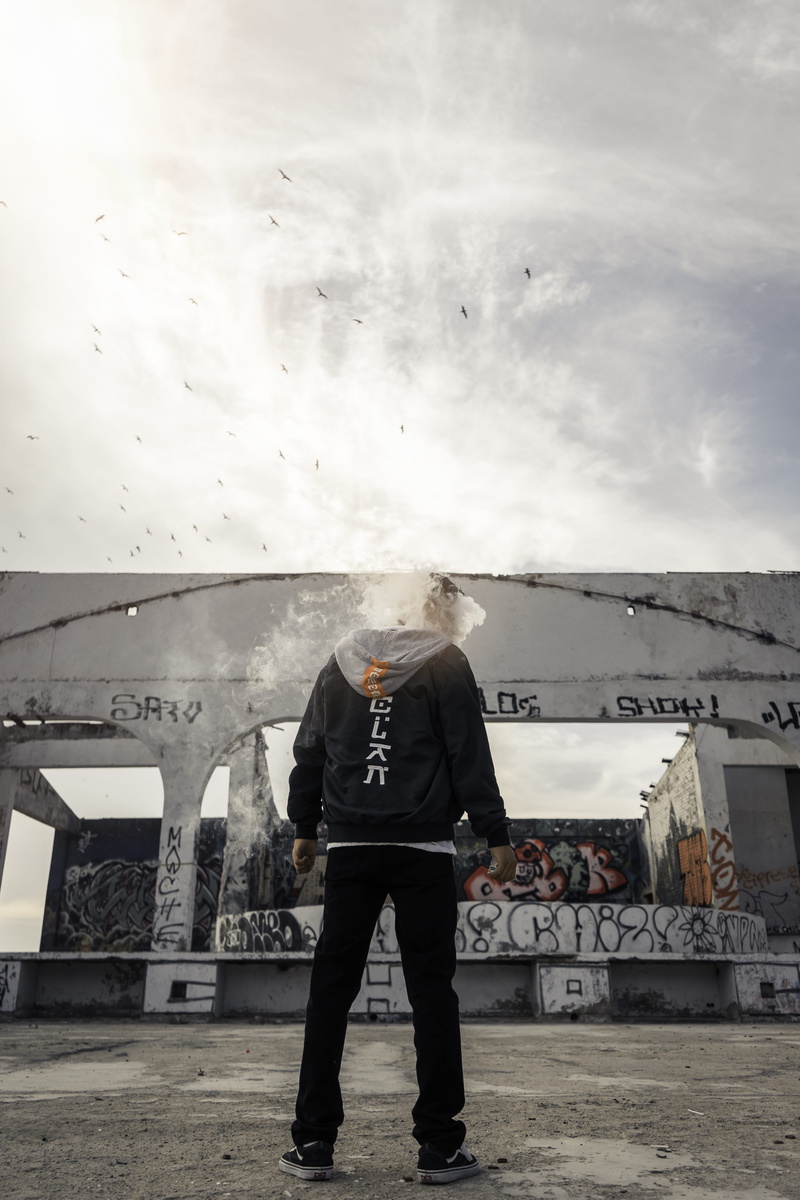 casual clothing, leisure activity, headless, day, men, pants, standing, communication, near, nature, building exterior, 5K, structure, full length, black