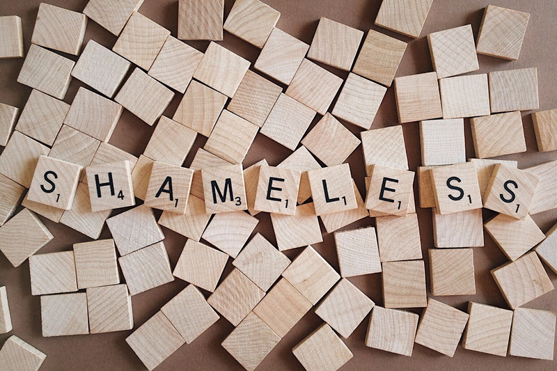 shame, letters, close-up, no people, large group of objects, shameless, stack, art and craft, box, shameful, pattern, high angle view, abundance, paper