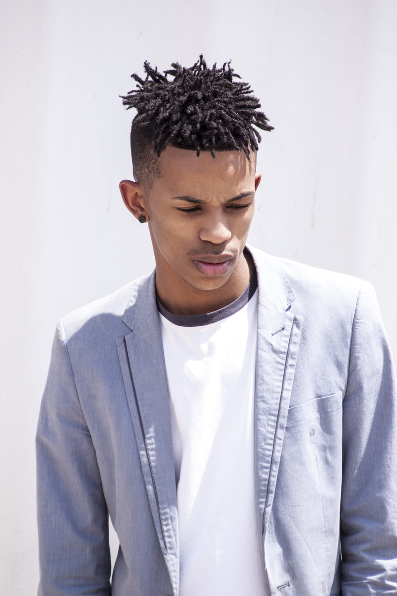 waist up, surface, background, man, portrait, teenager, young men, model, contemplation, young adult, hairstyle, design, poc, behind, white color, notched