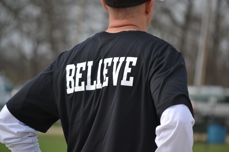 team, waist up, Believe, aggression, uniform, view, security, western script, inspiration, 4K, t-shirt, communication, word, sports, male, wearing, black