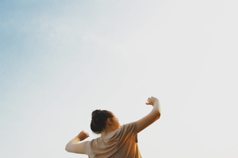 portrait, hands up, positive emotion, hands raised, casual clothing, low angle, human arm, model, gray, outdoors, mood, one person, hand raised, emotion