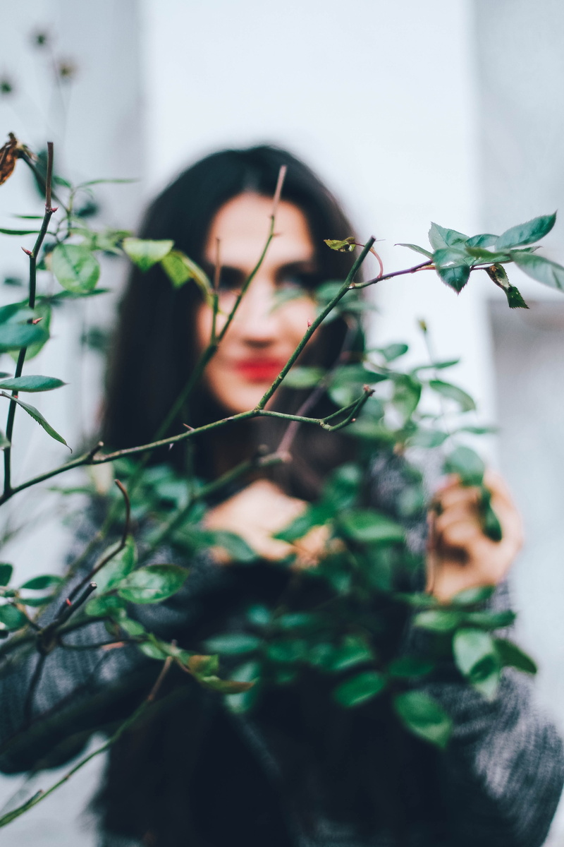 forest, green color, leaf, young women, 5K, front view, real people, text background, nature, plant, selective focus, one person, leisure activity, leafs