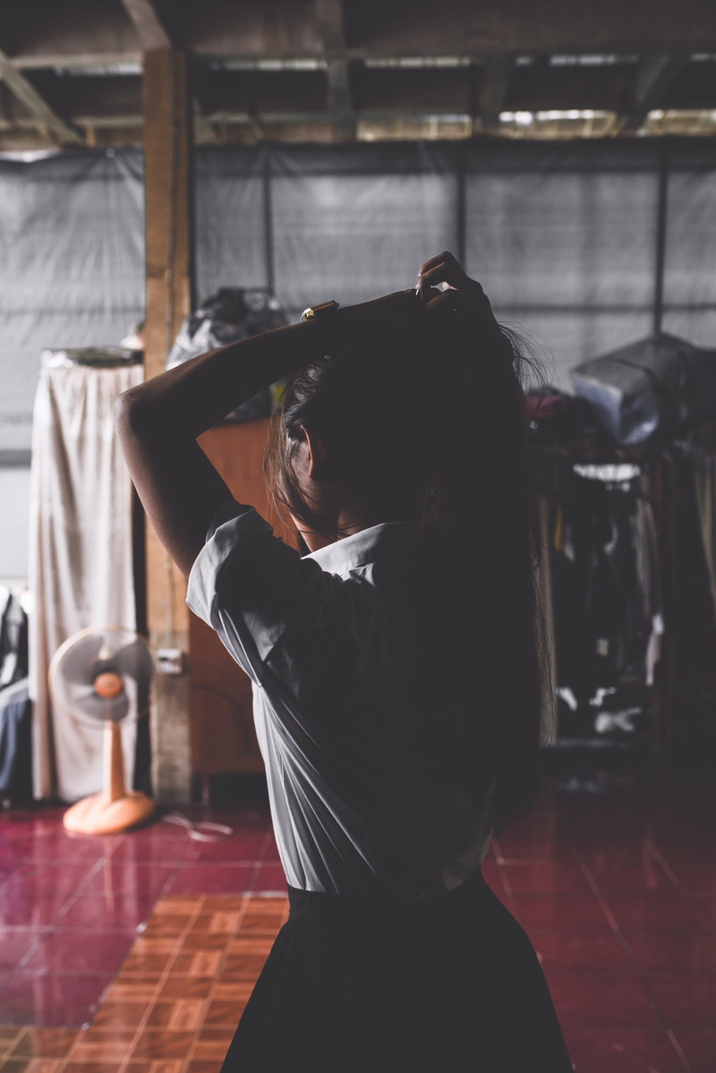 long hair, lifestyles, real people, hair tanned woman girl uniform cambodian, hand in hair, photography, waist up, leisure activity, portrait, adult, room