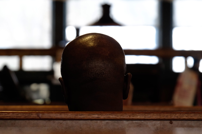 close-up, brown, architecture, bald, wood - material, one person, table, focus on foreground, nape, black color, selective focus, seat, head, building