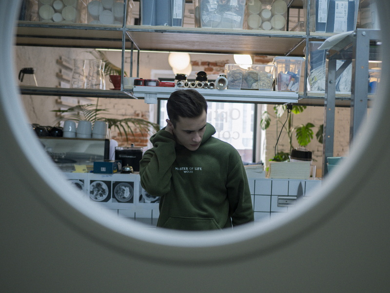 cafe, porthole, real people, style, young adult, men, casual clothing, long sleeve, business, door, holding, clothing, model, looking, nape, adult, occupation