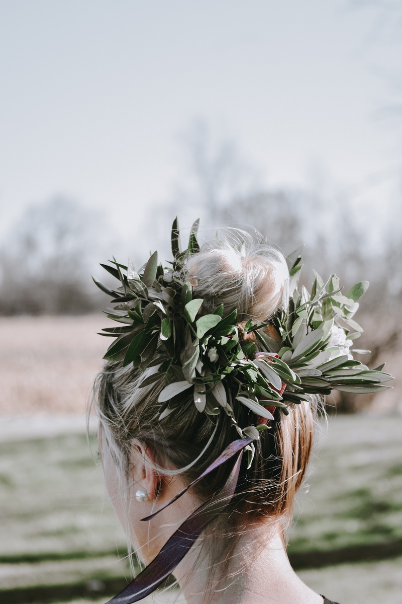 person, headshot, flowering plant, girl, pose, adult, day, outdoors, hair, woman, nape, flower, sky, flower arrangement, outdoor, green, outside, human hair