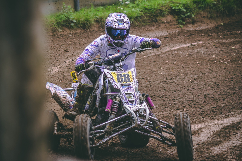 sunlight, clothing, wood - material, field, front view, throwing dirt, 4stroke, landscape, tree, atv, gray, person, racing, 4wheeler, sky, pushing, mx