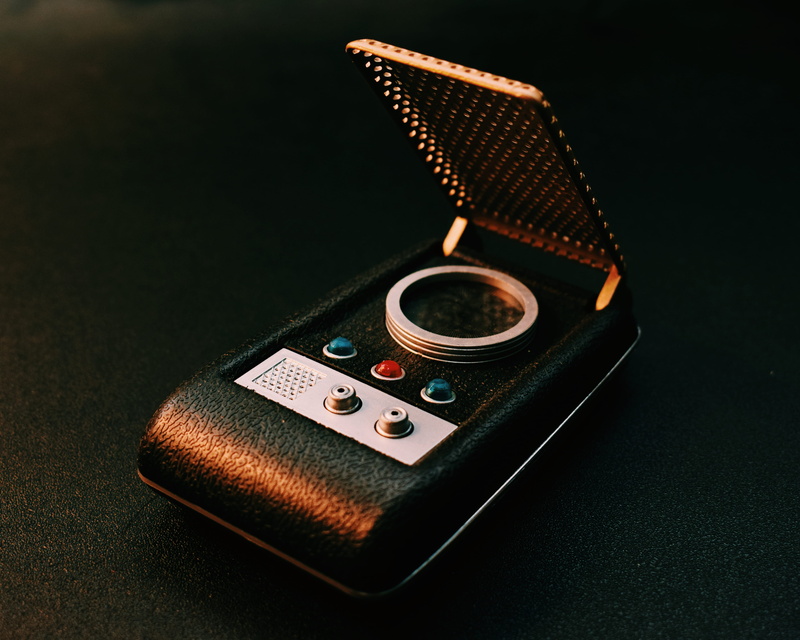 single object, wireless technology, macro, studio shot, science, control, leather, mobile phone, black background, arts culture and entertainment, the original series