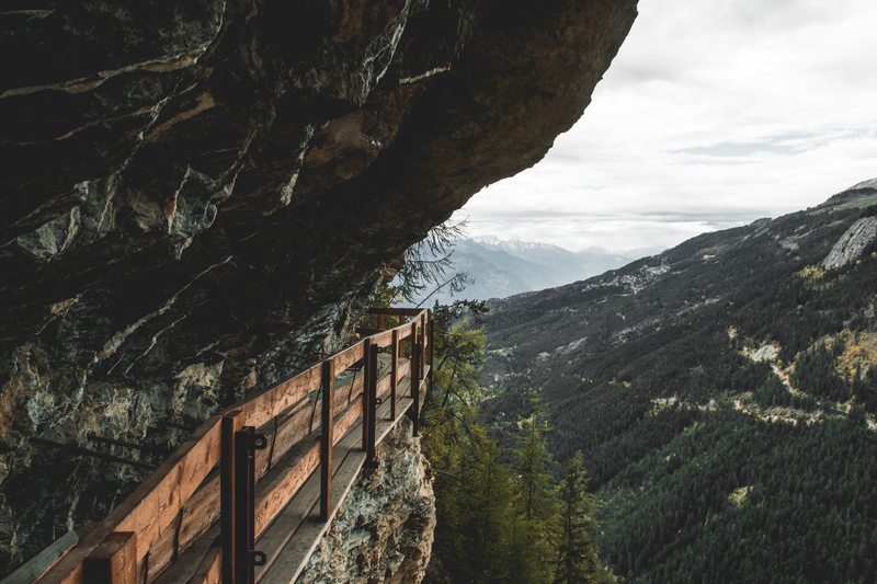 ice, mountain range, tranquil scene, tree, sky, switzerland, architecture, cliff, scenery, plant, formation, travel, no people, crans-montana, housing