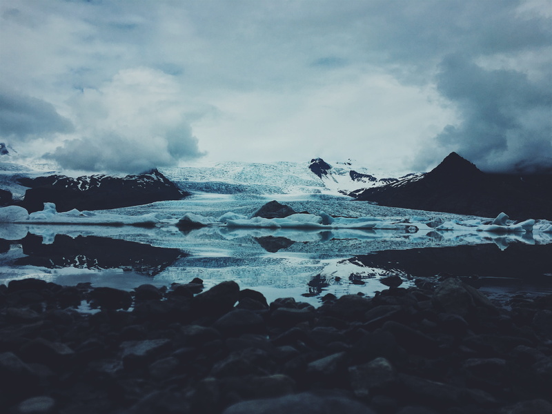 earth, no people, motion, landscape, clouds, iceland, eastern region, nature, rocks, outside, snow, landslide, land, sky, tranquility, scenics - nature