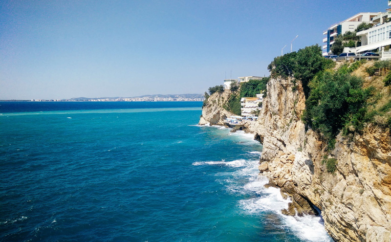 rock - object, summertime, beach landscape, land, fun, tranquil scene, holidays, water, architecture, beauty in nature, albania, summer vibes, nature, blue