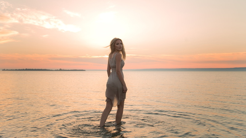 Aleksey Lozgachev, sea, women, blonde, in water, portrait, horizon, dress, looking at viewer, sunset, model, 720P, women outdoors, outdoors