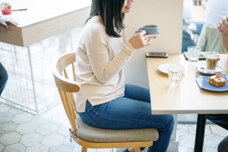 female, casual clothing, bright, mug, chair, room, vibrant, food and drink, date, real people, woman, person, indoors, food, sitting, table, office, 5K