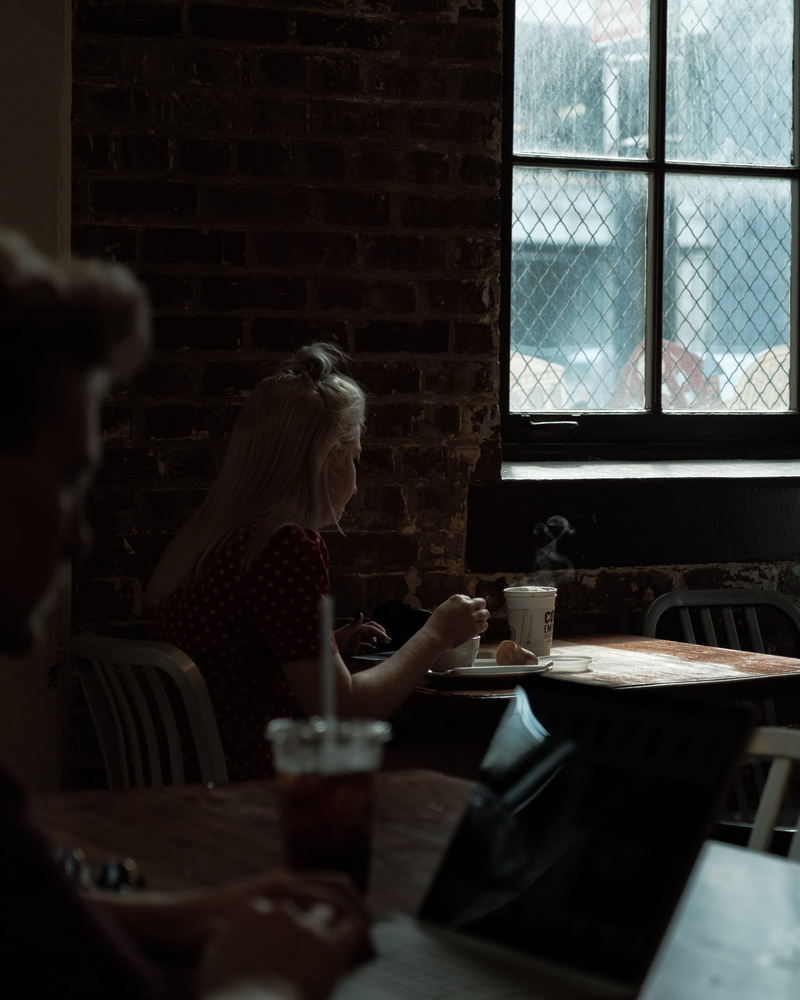 room, dining room, human, grey, housing, drink, furniture, 1080P, hairstyle, business, woman, apartment, restaurant, interior design, blonde, cup, coffee cup